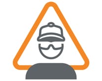 Pomarańczowy trójkąt z ikoną osoby noszącej kask i okulary ochronne